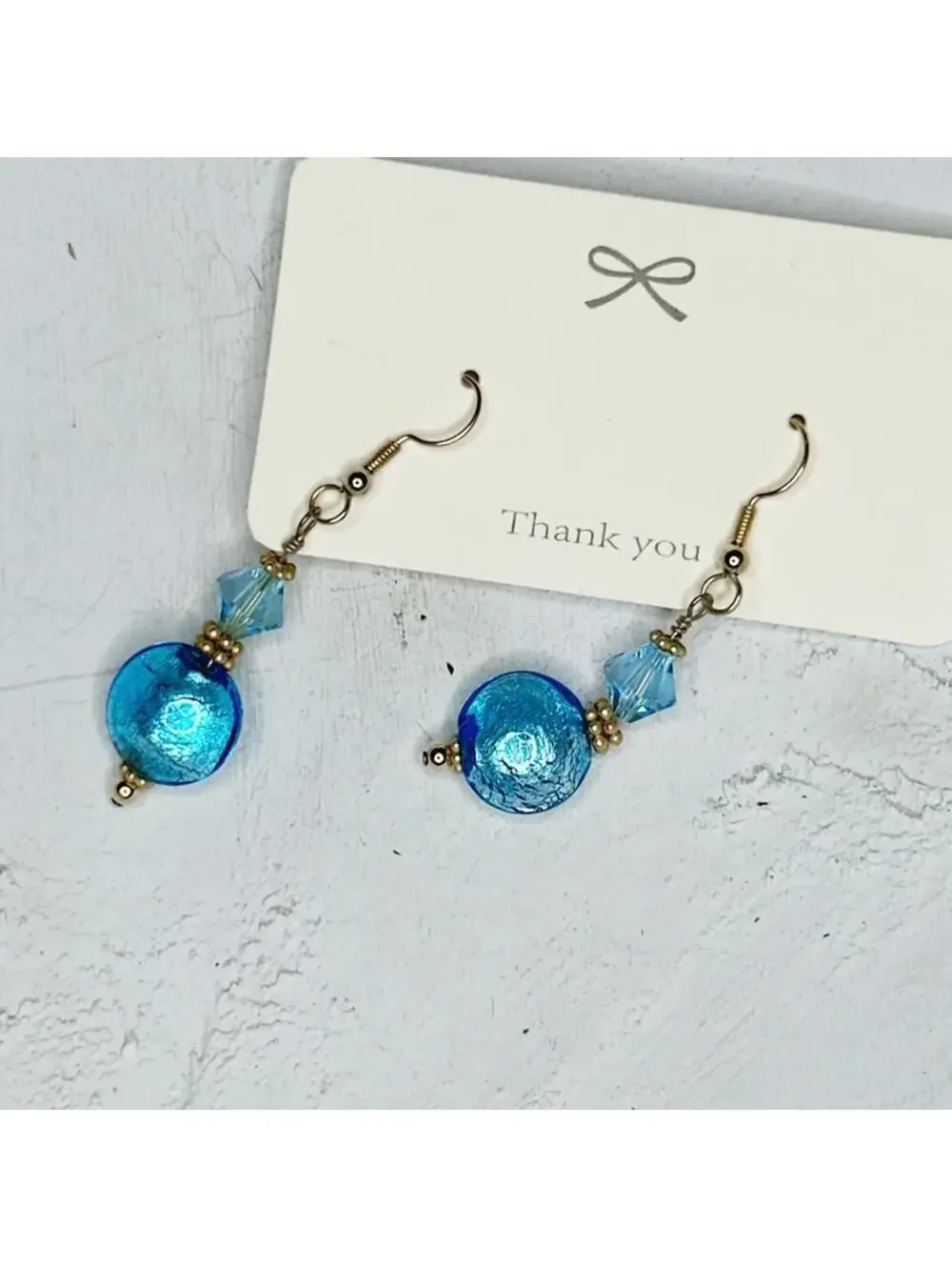 7548u. Aqua and Goldtone Glass Earrings